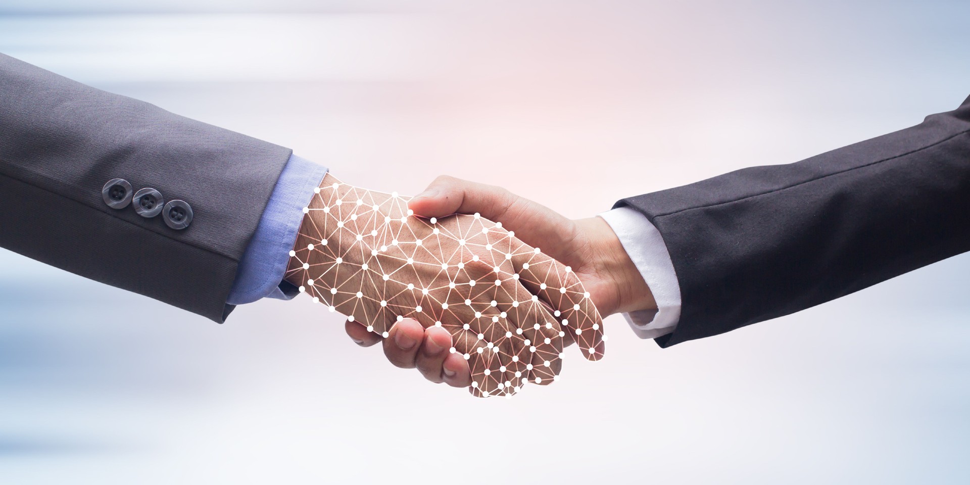 close up business man handshake with business artificial intelligence (AI) on motion blur background for future technology concept